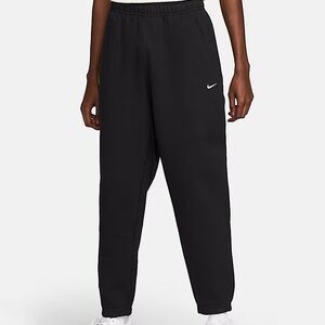 Nike Solo Swoosh Black Sweatpants with white Logo